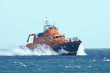 Two people saved from capsized boat off Penzance