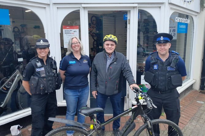Wadebridge Police with staff at Wadebridge bike shop.