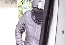 Police release images of man wanted in connection with armed robbery