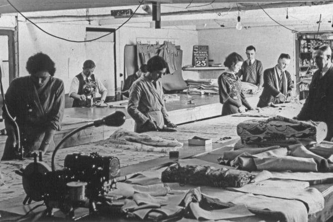 The cutting room at Crysede Island Works, the former Western Pilchard cellar at the base of The Island in St Ives, in the 1930s.  
