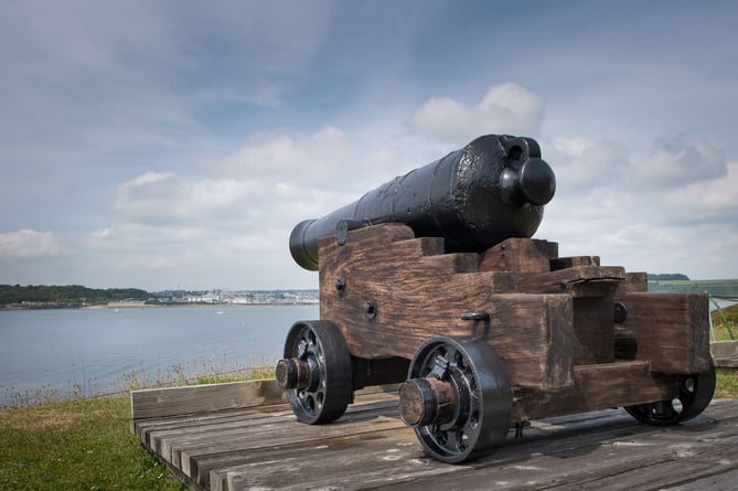 A newly restored cannon from the early 19th century looks out to sea