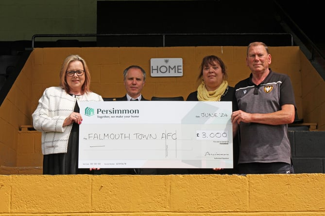 A cheque for £3,000 was presented to Falmouth Town AFC from local housebuilder Persimmon