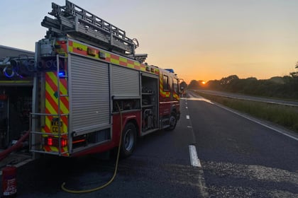 Fire crews tackle large vehicle blaze on the A30 at Mitchell 
