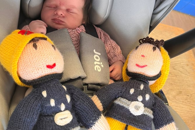 Baby Olive with woolly firefighters