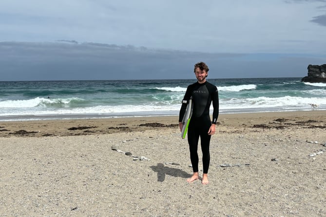 Surfer Jamie Luther on Portreath beach