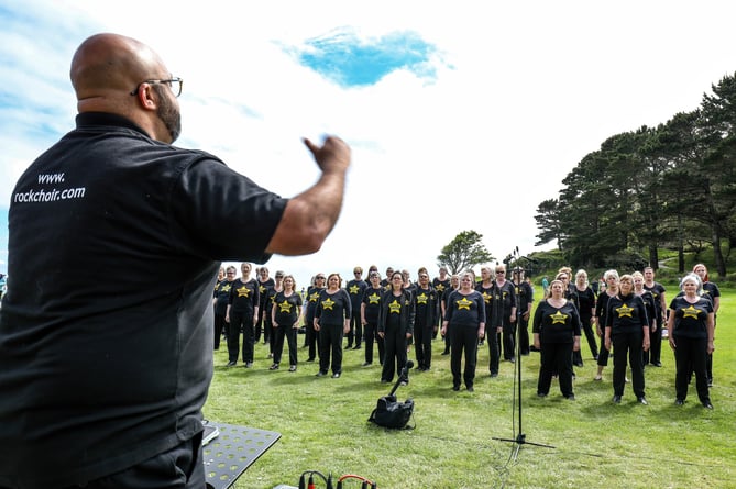 The event opens with the 200-strong Cornwall Rock Choir