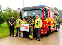 Firefighter raises more than £1,300 with challenging charity walk