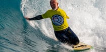 Amputee surfer rides the waves to national championship after surgery