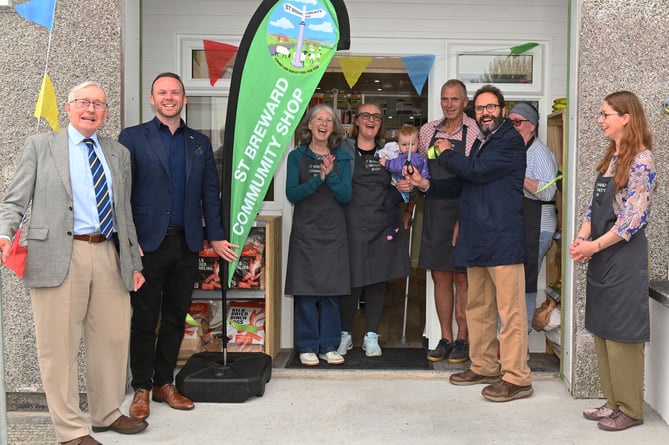 A proud moment for the St Breward Community as Dominic Fairman (Cornwall Councillor St Teath and Tintagel Division) cuts the ribbon to open the new St Breward Community Shop along with local MP Ben Maguire and members of the community shop.