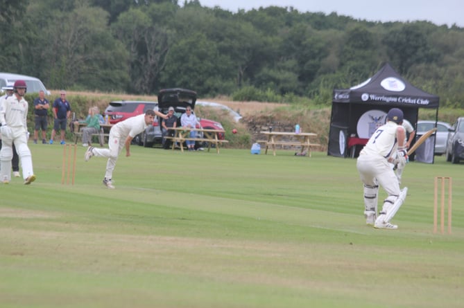 Sam Hockin sends down a delivery to St Austell opener Dan Jarman. Picture: Paul Hamlyn