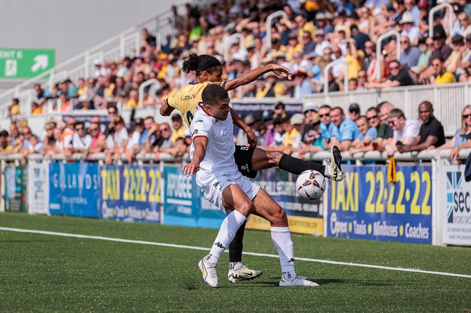 Christian Oxlade-Chamberlain looks to win the ball at Maidstone United on Saturday.