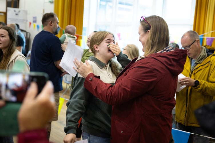 Hattie is overjoyed as she opens her results, celebrating a string of top grades that exceed her expectations