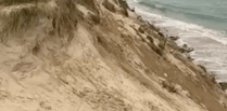 Safety warning following dune collapse amid super high spring tides