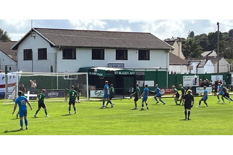 A Tom Payne free-kick causes problems in the St Blazey penalty area. Picture: Kevin Marriott.