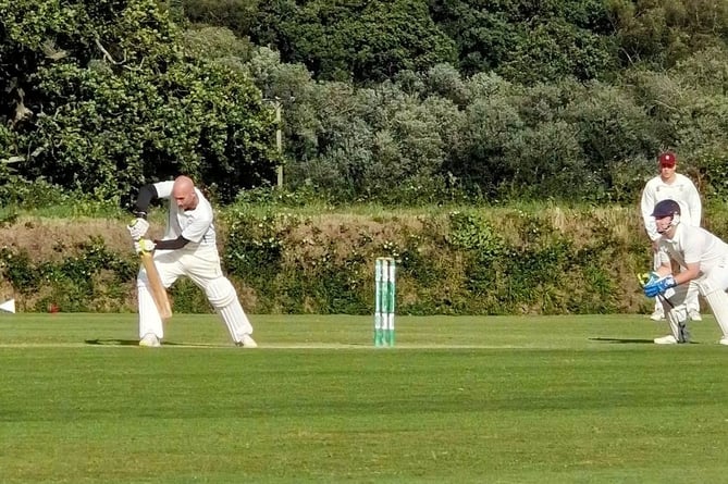 Gunnislake all-rounder Graeme Murray gets forward to a delivery at Werrington on Saturday.