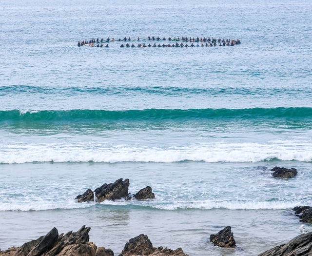 Memorial paddle out held for surfing pioneer