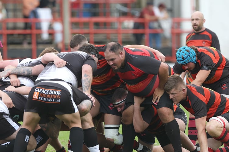 Liskeard-Looe's pack which included new signing prop TJ Hicks (pictured front right) get ready for a scrum. Picture: Glen Rogers