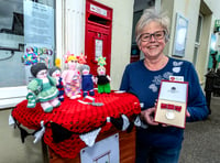 Yarn-bombing surprise for delighted village postmistress