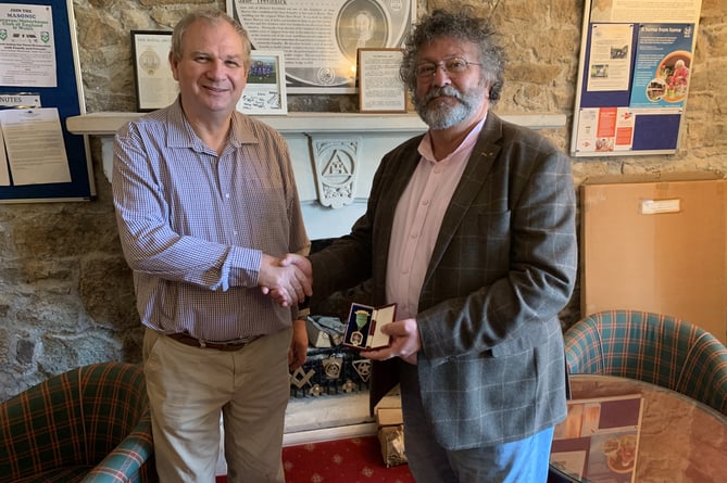 Peter English presents Peter Everest with the rare Oddfellows jewel - 2