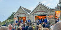 Historic harbourside pub damaged by fire officially reopens