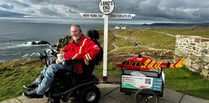 Steven reaches Land's End in his electric wheelchair