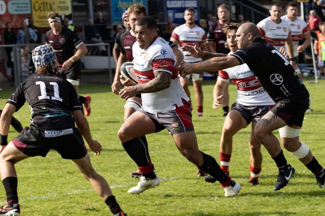 Camborne centre Josh Matavesi runs through the Taunton Titans defence on Saturday. Picture: Steve Mock