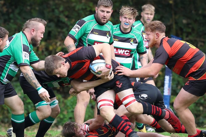 Liskeard-Looe lock Yestin Hutchings runs at the Hayle defence. Picture: Glen Rogers