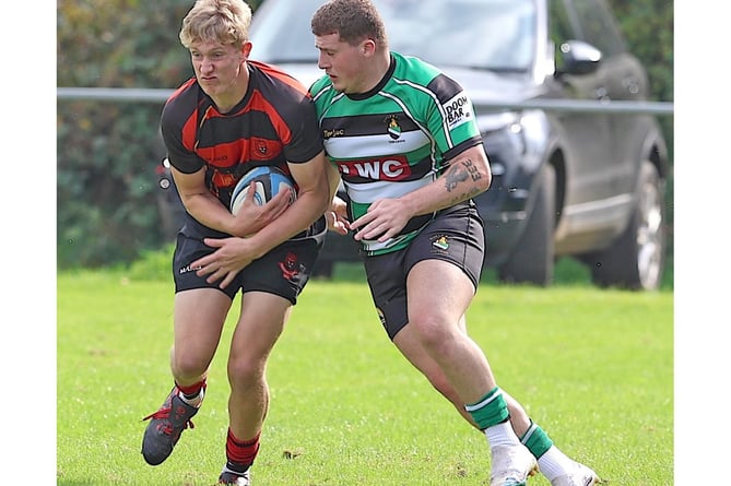 Winger Dan Crowther, pictured on the ball, scored his first Liskeard-Looe try at Lux Park. Picture: Glen Rogers