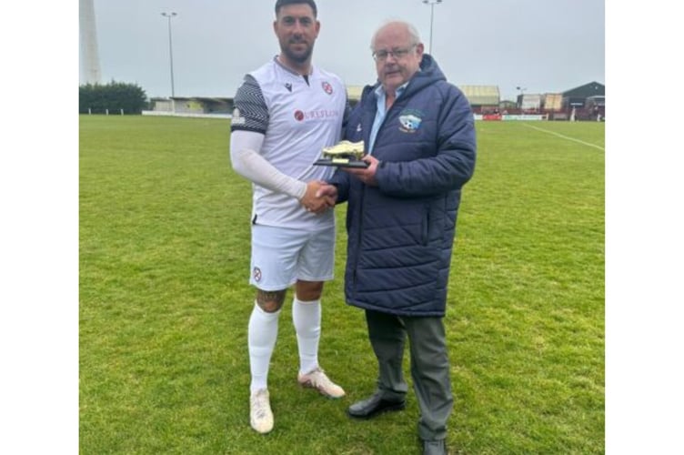 Adam Carter, pictured receiving the 2023/24 SWPL Premier West golden boot from Peter Stevenson at Launceston AFC back in the spring, scored on his return from a calf injury at Ivybridge on Tuesday night. Picture: South West Peninsula League