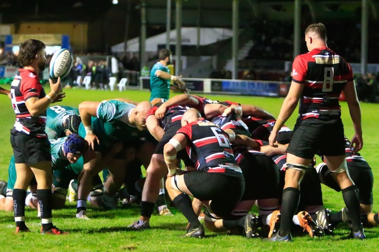 Both teams prepare for a scrum at the Mennaye Field on Friday night Picture: Brian Tempest