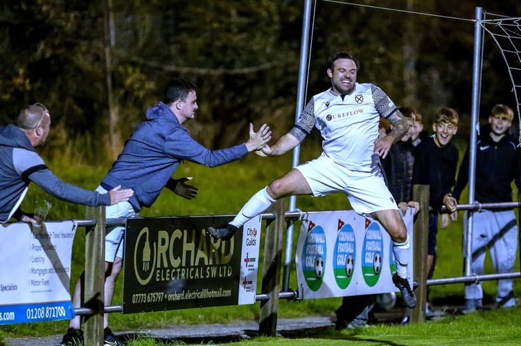 St Austell's Liam Eddy, pictured scoring against Buckland Athletic recently, found the net twice at Mill Road. Picture: Paul Williams