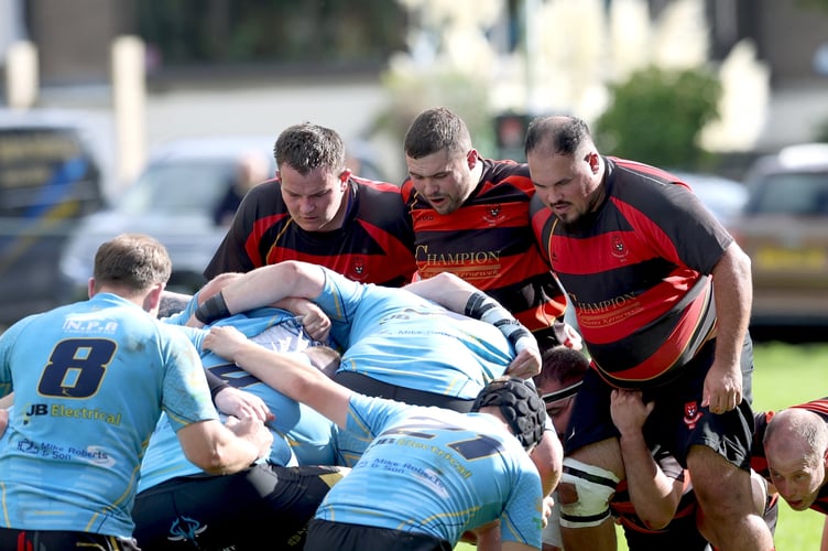 Liskeard-Looe's front row of TJ Hicks (right), Archie Doidge (centre) and Jack Wilton prepare for a scrum against Veor on Saturday. Picture: Glen Rogers