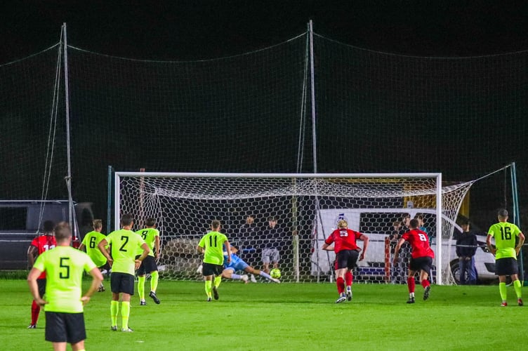 Macauley Thorp sends James Morley the wrong way from the penalty spot to draw Liskeard level. Picture: Colin Hilton