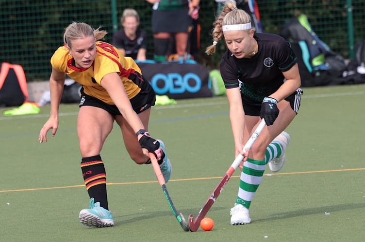 Caradon's player of the match Abby Ingram (left) looks to steal possession. Picture: Glen Rogers