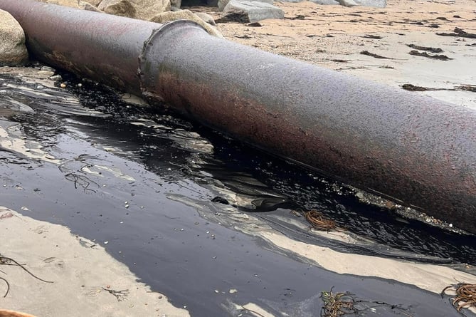 Broken pipe on a beach between Marazion and Penzance