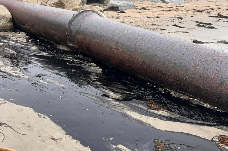 Broken pipe on a beach between Marazion and Penzance