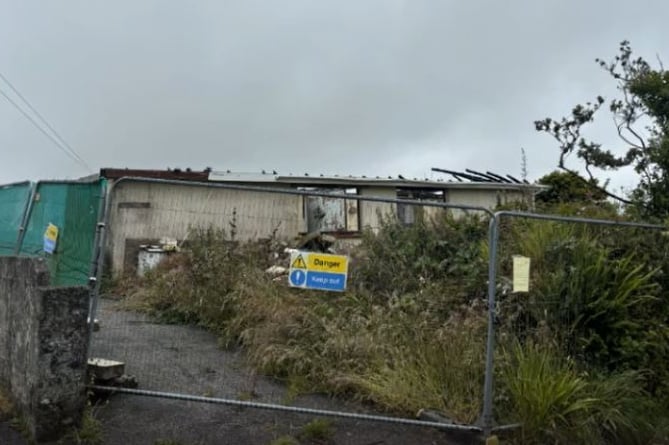 The fire-damaged bungalow in Four Lanes