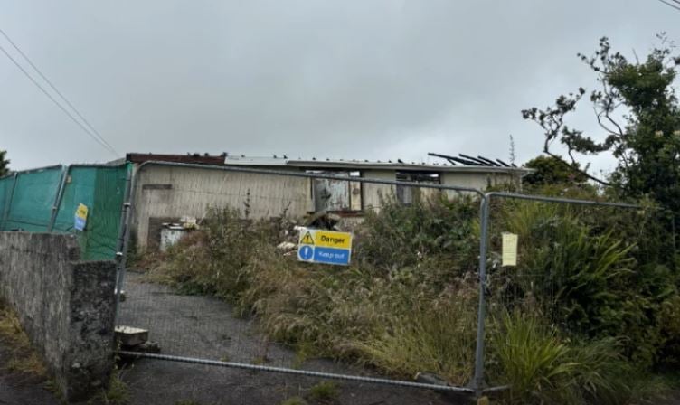 The fire-damaged bungalow in Four Lanes