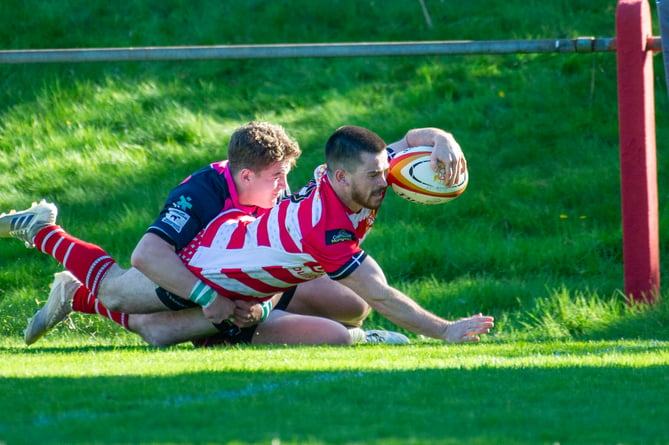 Dan Tyrrell scores in the left corner for St Austell's second try. Picture: Dave Phillips