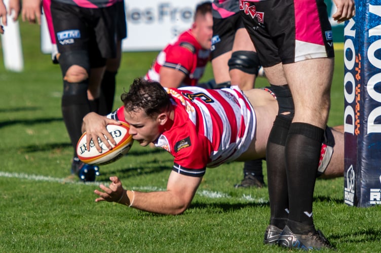 Matt Boothby dives over for St Austell's first try of the afternoon. Picture: Dave Phillips