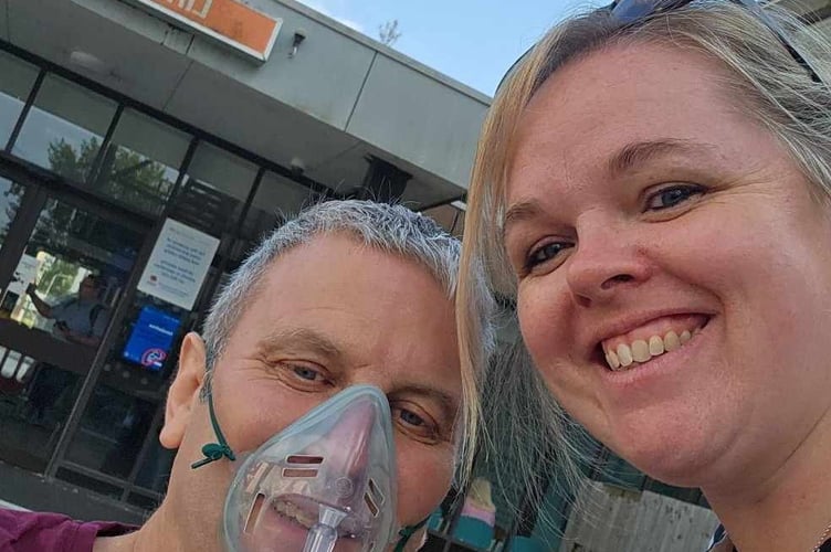 Mike Reynolds and Lara Reynolds outside hospital. A woman married her husband in hospital 48 hours before his death - and has shared her story to raise awareness of his disease. Mike Reynolds was in hospital suffering from recently diagnosed pulmonary fibrosis. He married partner of eight years Lara in a touching ceremony organised by the bride in just one day. After delivery driver Mike was diagnosed with the lung condition in May the couple's life "turned upside down." 