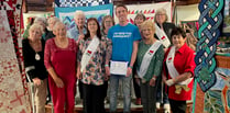 Quilters and crafters give £700 to charity