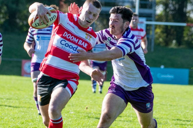 Fly-half Archie Bees on his way to scoring. Picture: Dave Phillips