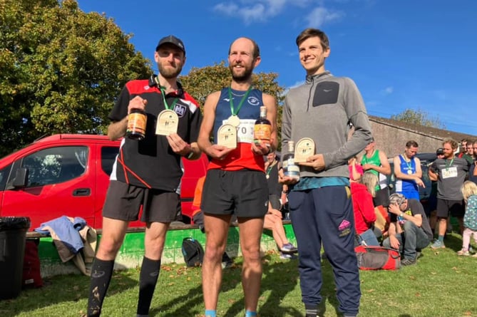 The top three in the men's race at the Rosemullion 10K. From left: Steve Reynolds (second), Ed Dickinson (winner) and Ross Pascoe (third). Picture: Rosemullion 10K.