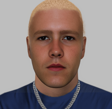 The male is reported to have been wearing a silver link chain, a navy t-shirt and shorts