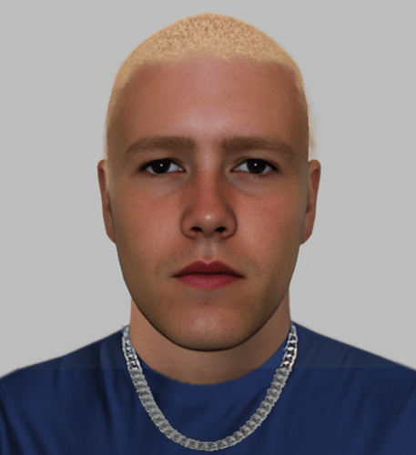 The male is reported to have been wearing a silver link chain, a navy t-shirt and shorts