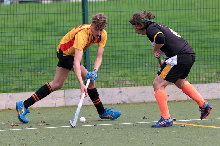 Caradon's Ben Reynolds looks to get past his opponent on the byline. Picture: Glen Rogers