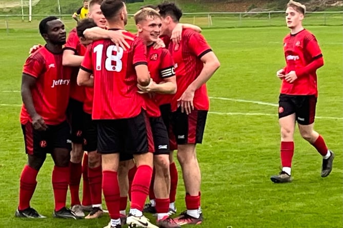 Dobwalls celebrate their match-clinching goal in their 4-2 success at St Day on Saturday which was scored by Dan Tate (18). Picture: Kevin Marriott