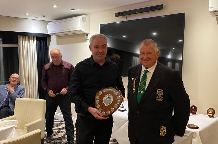 Club captain Dave Juleff's club member of the year award went to Simon Wells (left). 