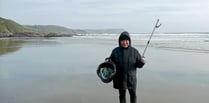 Connecting with nature and clearing rubbish from a beach